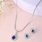 VOJ Silver Plated Blue Ad-Studded Pendant With Chain And Earrings Set - Swadesiicart