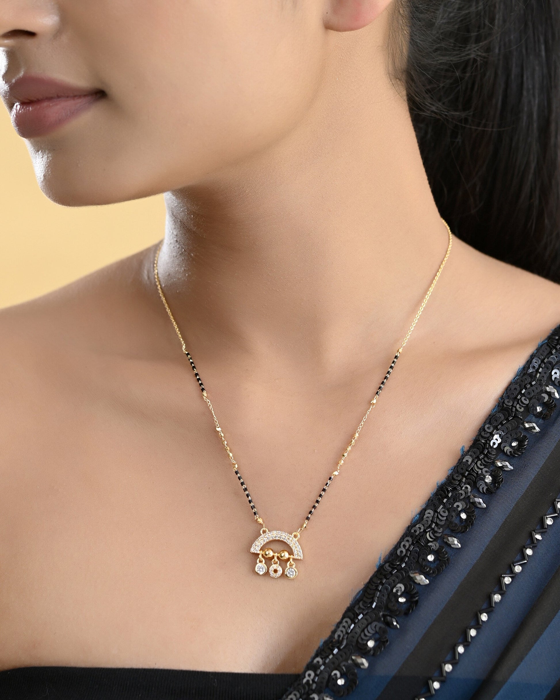 VOJ Gold-Polished AD Studded Half Done Shape Mangalsutra - Swadesiicart