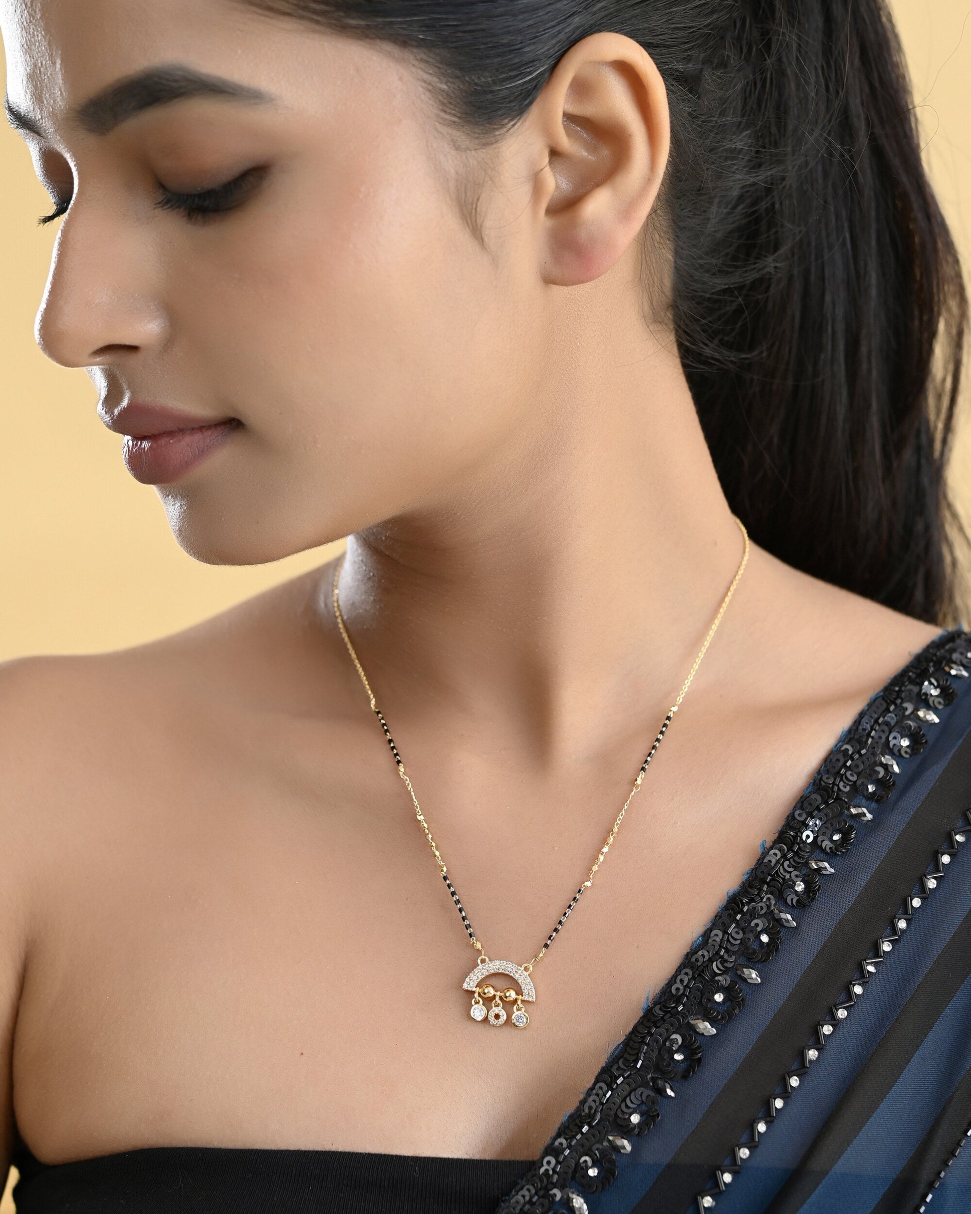 VOJ Gold-Polished AD Studded Half Done Shape Mangalsutra - Swadesiicart