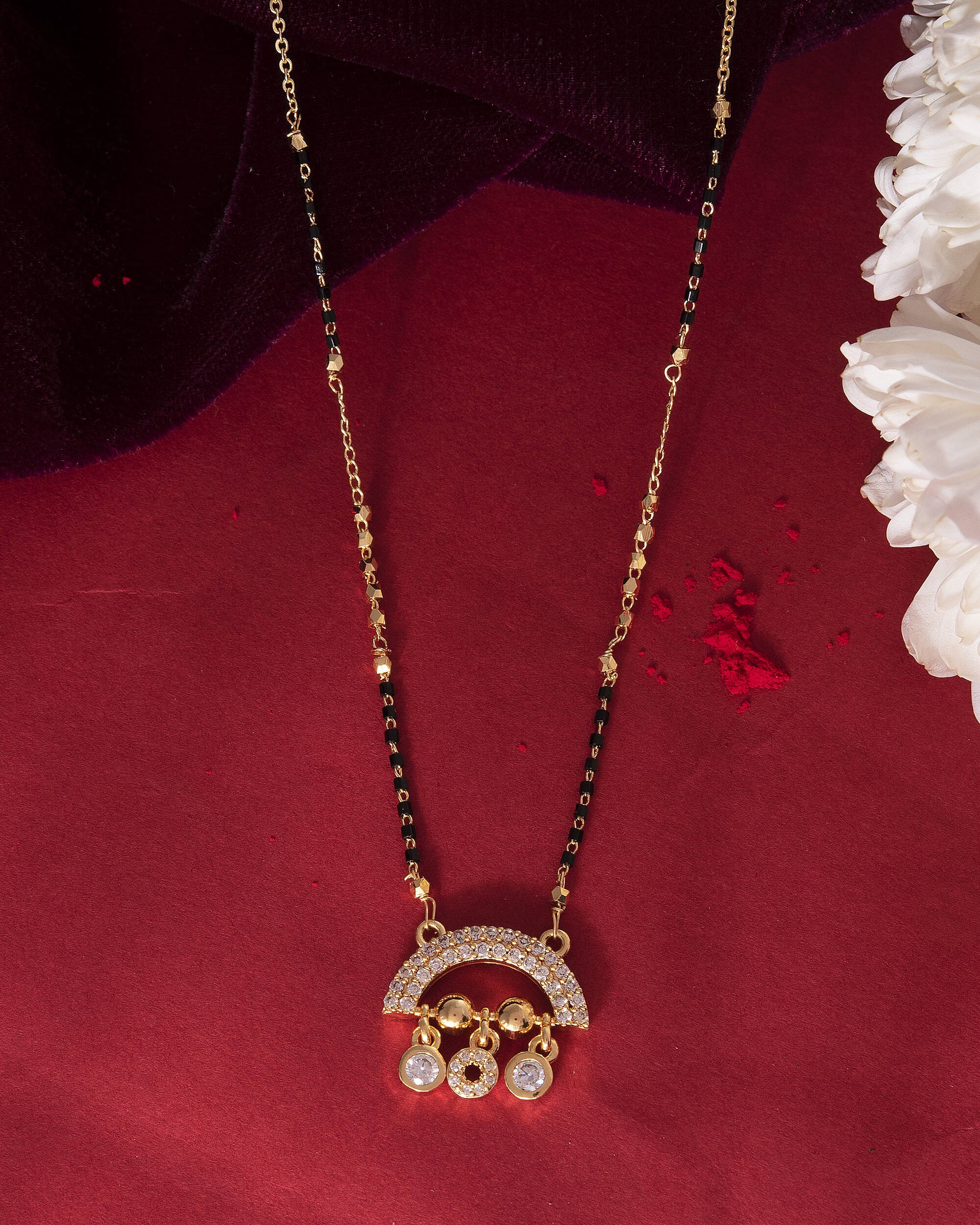 VOJ Gold-Polished AD Studded Half Done Shape Mangalsutra - Swadesiicart