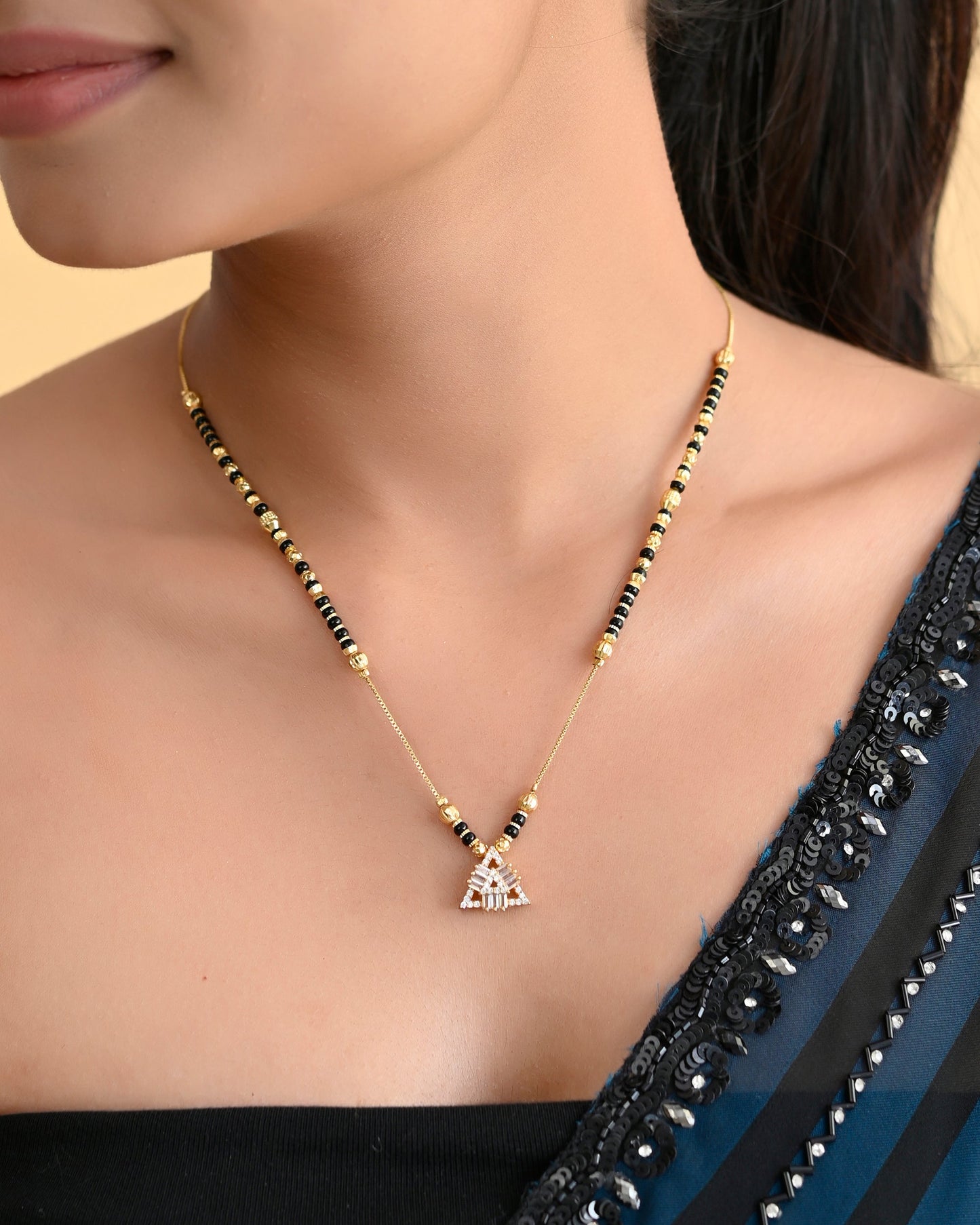 VOJ Gold-Polished Stone Studded Triangular Shaped Mangalsutra - Swadesiicart