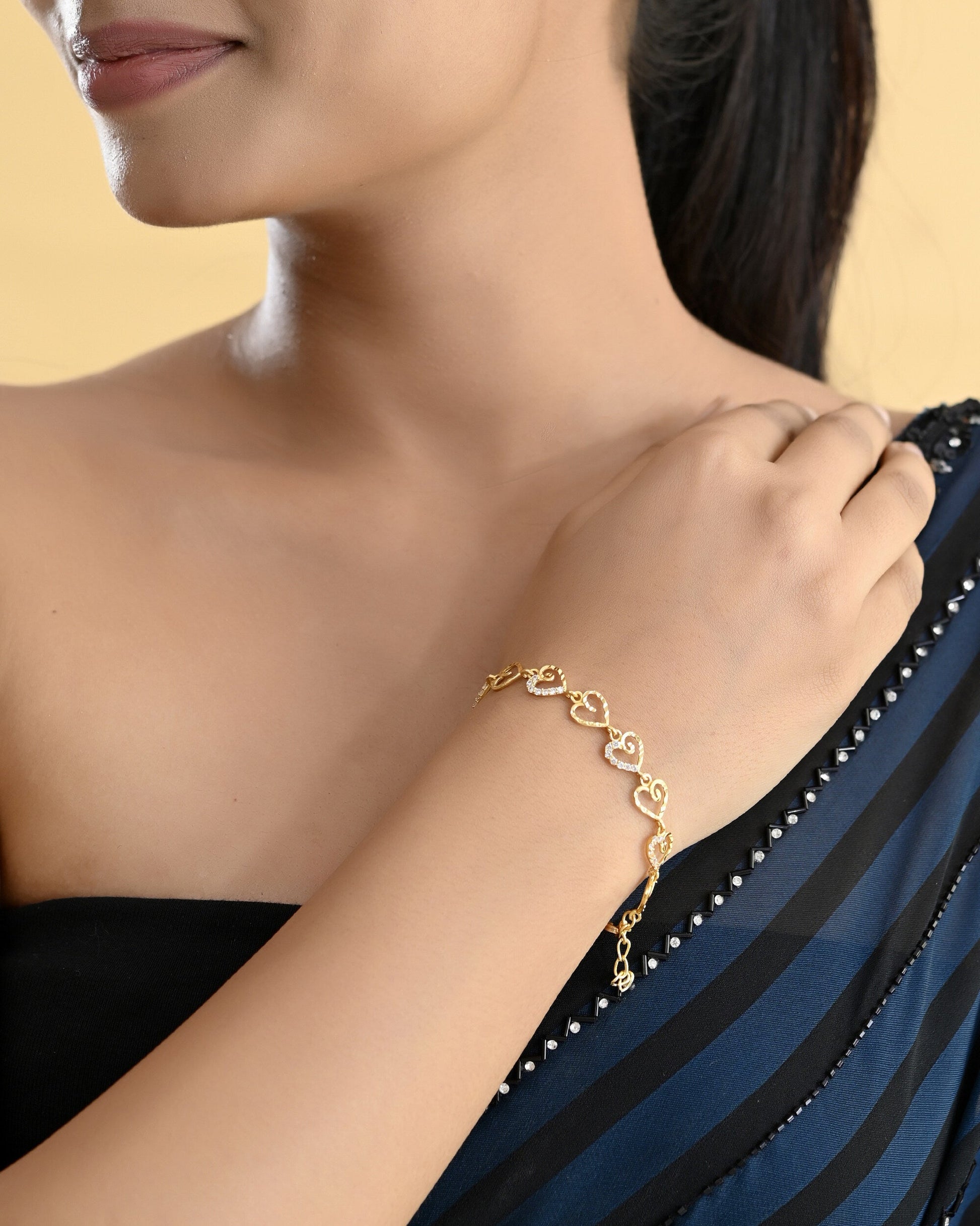 VOJ Gold-Polished Heart Shapped AD Stone Studded Women's Bracelet - Swadesiicart