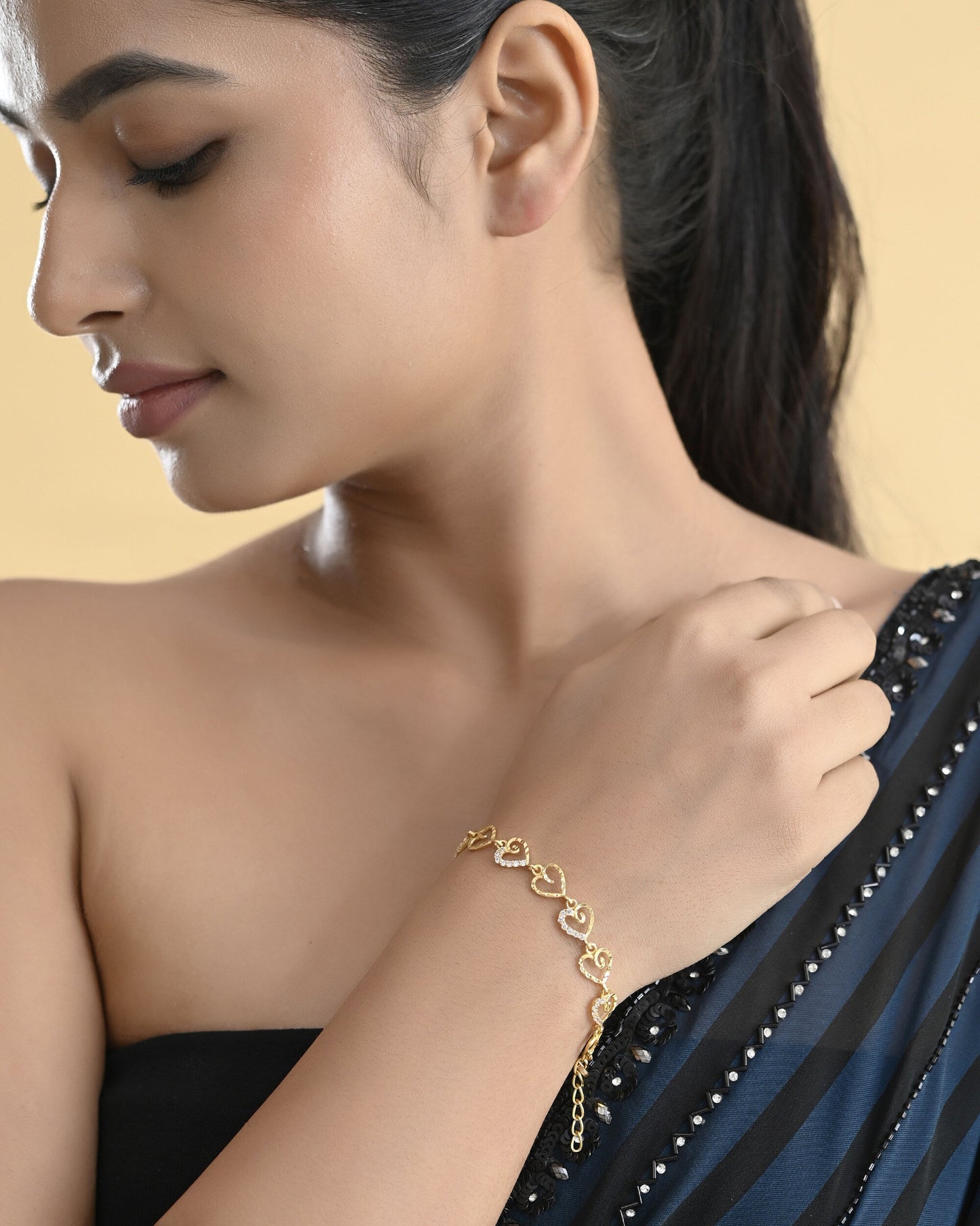 VOJ Gold-Polished Heart Shapped AD Stone Studded Women's Bracelet - Swadesiicart