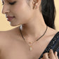 VOJ Gold-Polished Doll Shapped Stone Studded Mangalsutra With Earrings Set - Swadesiicart