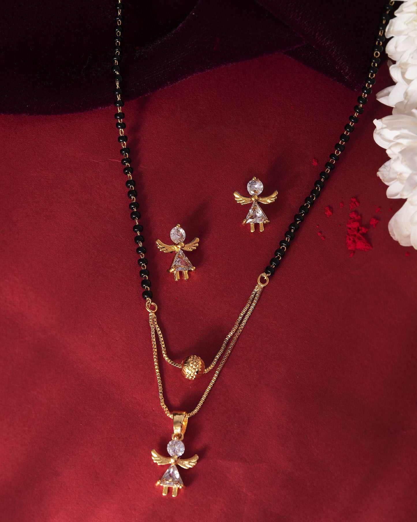 VOJ Gold-Polished Doll Shapped Stone Studded Mangalsutra With Earrings Set - Swadesiicart