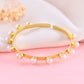 VOJ Gold-Polished Pearl Studded Kada Barcelet - Swadesiicart