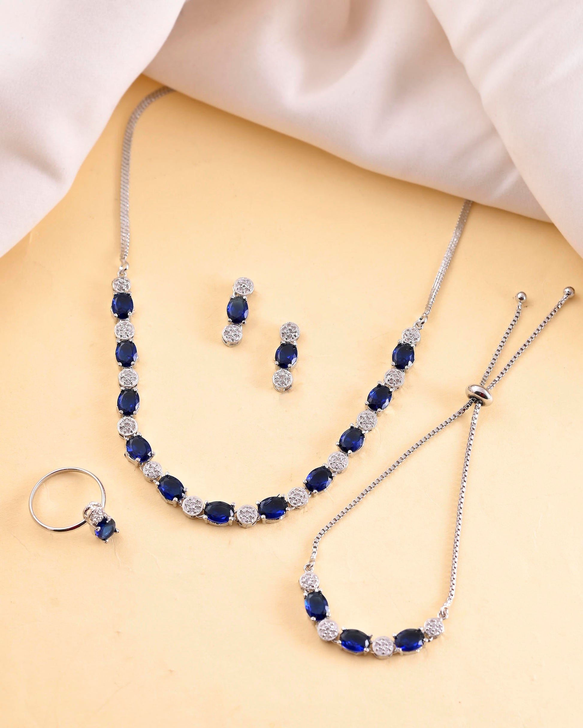 VOJ Silver Plated Blue Stone Studded Necklace Set With Ring And bracelet - Swadesiicart