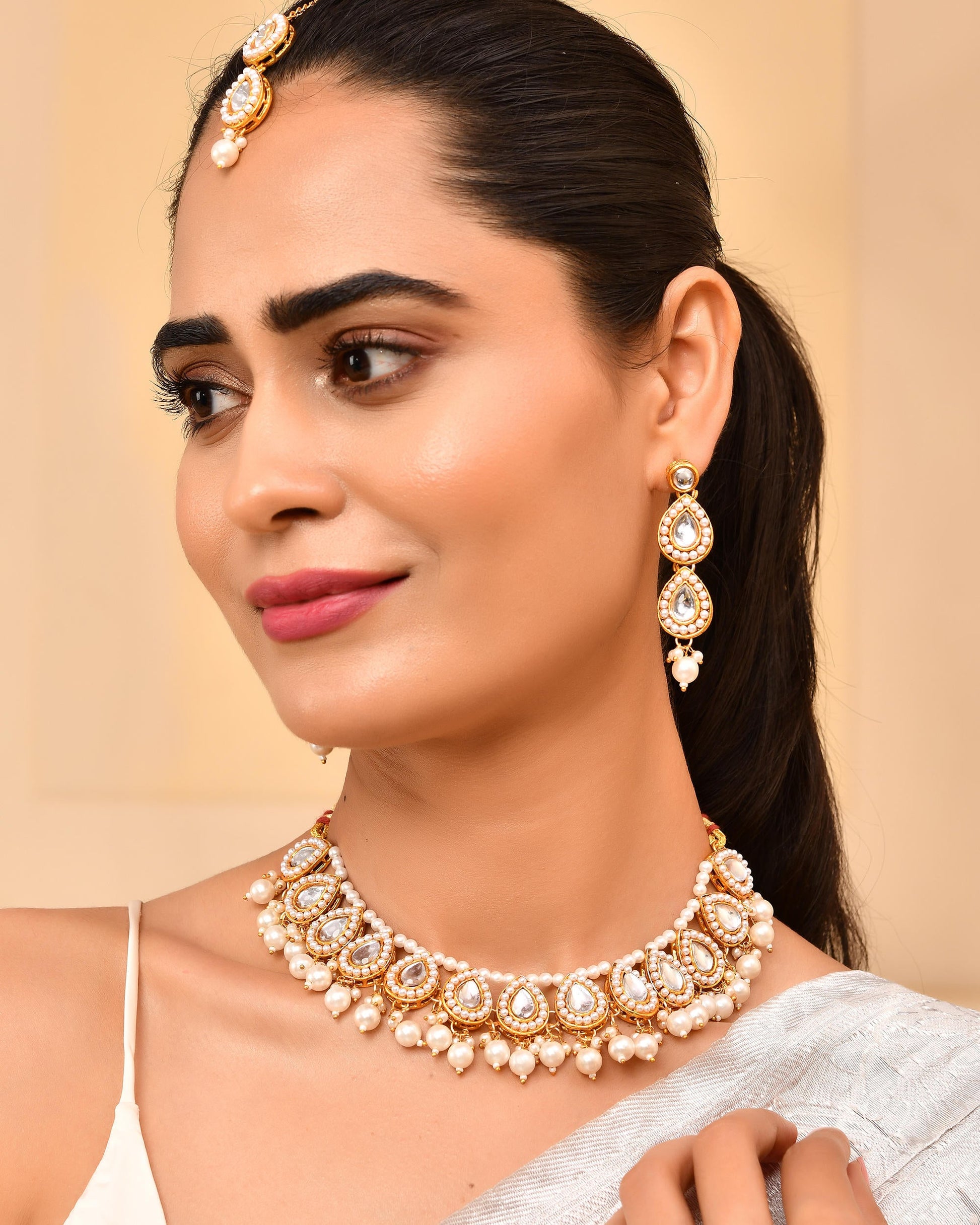 VOJ Gold-Polished Kundan Stones Studded Jewellery Set With Maang Tikka - Swadesiicart