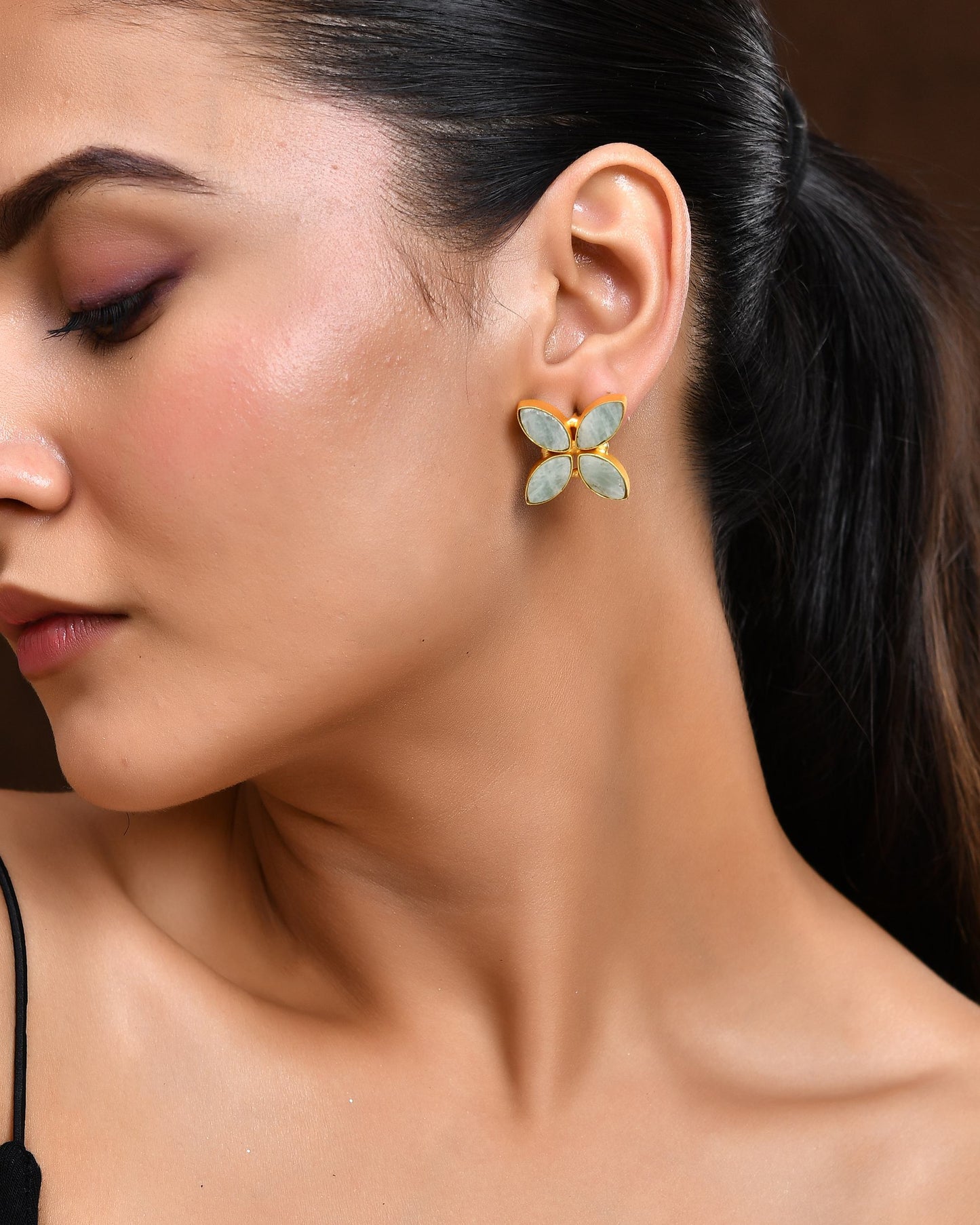 VOJ Gold Polished Teal Stone Studded Floral Stud Earrings - Swadesiicart
