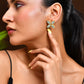 VOJ Gold Polished Teal Stone Studded Floral Stud Earrings - Swadesiicart