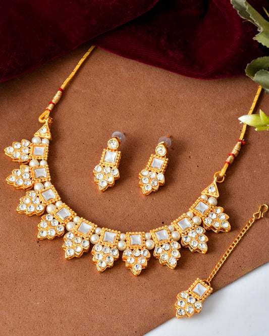 VOJ Gold Polished Stone Studded Necklace Set With Maang Tikka - Swadesiicart