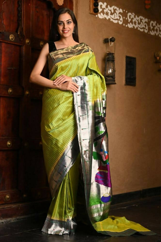 Very Much Indian Premium Handloom Pure Silk Muniya Borde-Parrot Green,Silver Zari And Intricate Big Radha Krishna Pallu | Swadesiicart