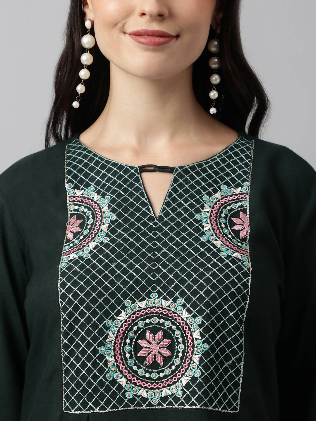 Green Rayon Yoke Embroidered A-line Top - Tarini - Swadesiicart