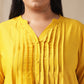 Janasya Pleated Muslin Yellow Solid Band Collar Kurta Set | Swadesiicart