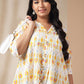 Janasya Pleated Cambric Off White Ikkat Notch Neck Tunic | Swadesiicart