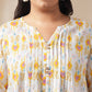 Janasya Pleated Cambric Off White Ikkat Notch Neck Tunic | Swadesiicart