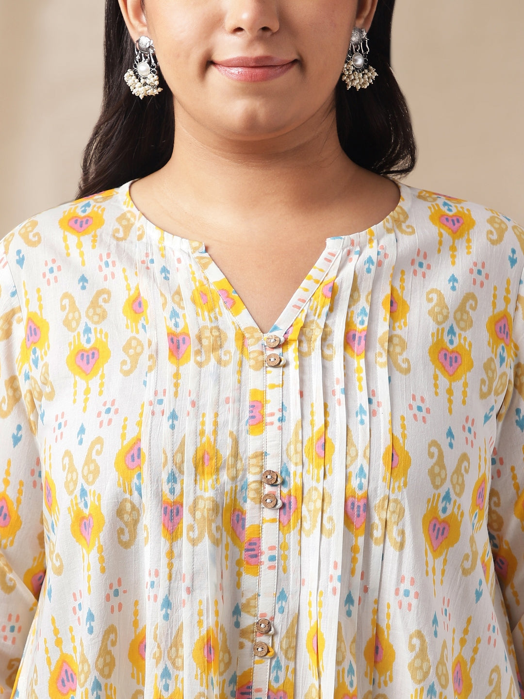 Janasya Pleated Cambric Off White Ikkat Notch Neck Tunic | Swadesiicart