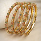NVR Women's Set of 4 Gold-Polished Beads Handcrafted Traditional Bangles - Swadesiicart