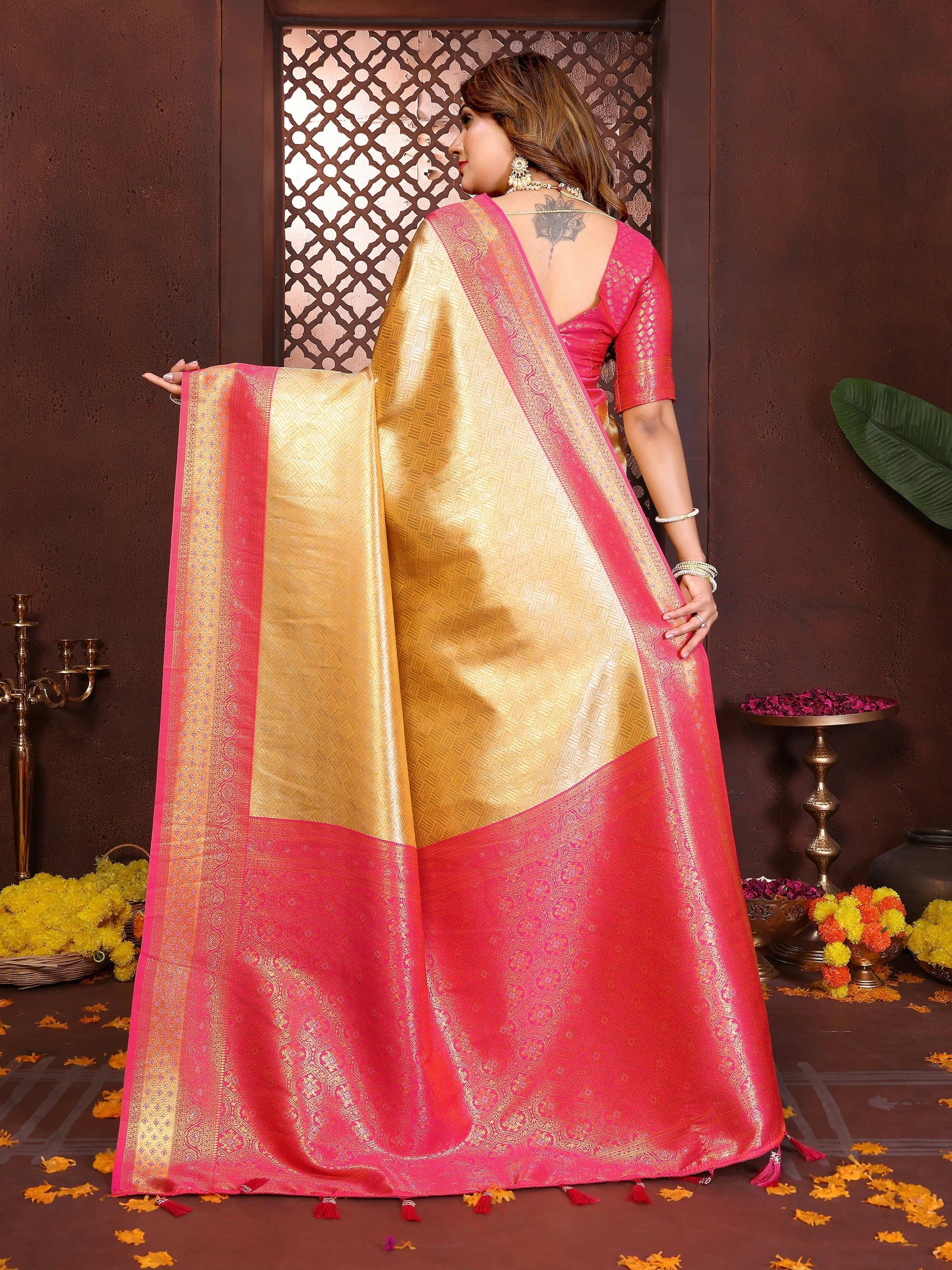 Aastha Fashion Cream Tissue Silk Woven Saree