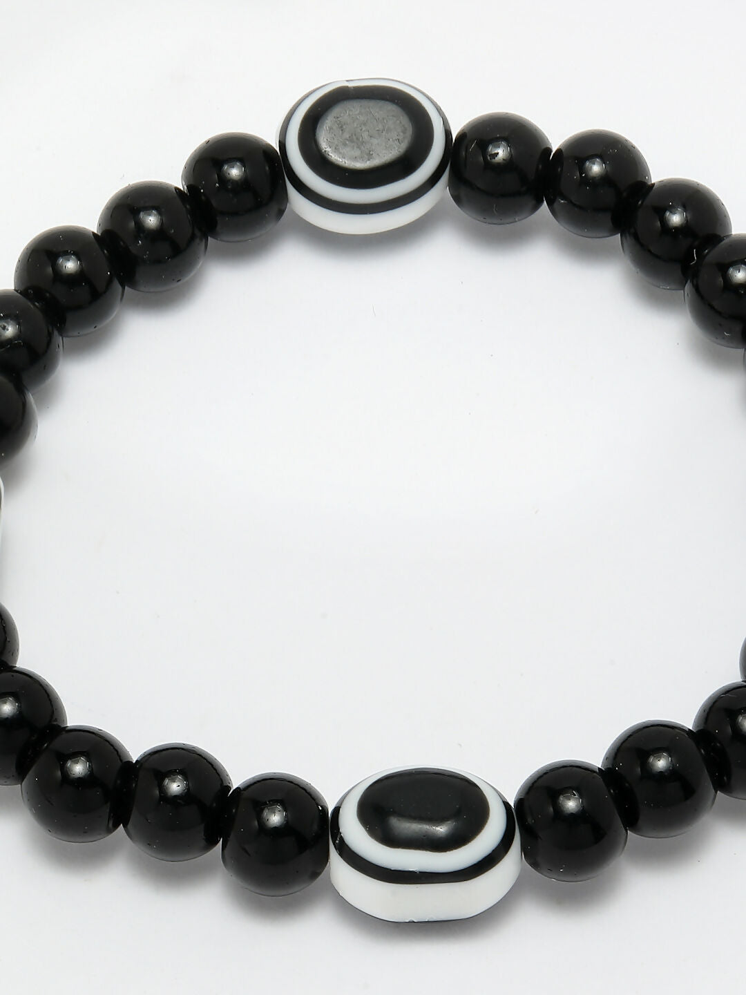NVR Women & Men Black Evil Eye Elasticated Rakhi With Roli Chawal - Swadesiicart