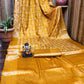 Anaita Yellow Soft Satin Silk Bandhej Print Saree With Kanchi Zari Weaving Border