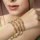 NVR Women's Set of 4 Gold-Polished Beads Handcrafted Traditional Bangles - Swadesiicart