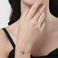 NVR Women Gold-Toned Blue Evil Eye Charm Bracelet - Swadesiicart