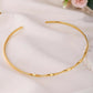 VOJ Gold-Polished Twisted Hasli Necklace | Swadesiicart