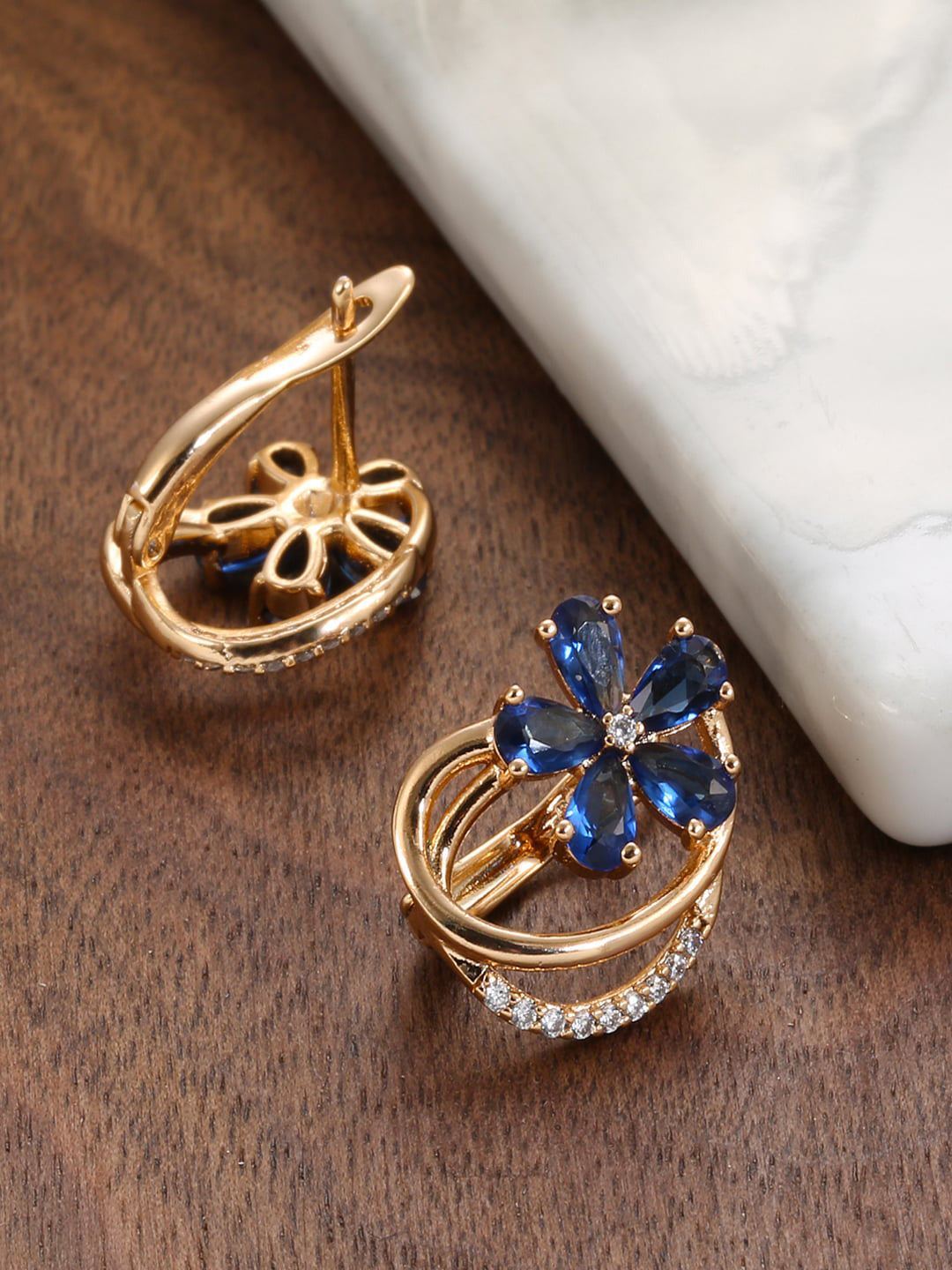 Shining Diva Rose Gold-Polished Blue Floral Studs Earrings - Swadesiicart