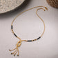AanyaCentric Gold-Polished Jewelry Combo: Elegant Short Mangalsutra, Finger Ring, and American Diamond Earrings Set