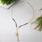 AanyaCentric Gold-Polished Jewelry Combo: Elegant Short Mangalsutra, Finger Ring, and American Diamond Earrings Set