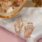 Shining Diva Gold-Polished Rose Zircon Earrings - Swadesiicart