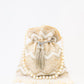 NR By Nidhi Rathi Cream-Coloured & Gold-Toned Embellished Potli Clutch - Swadesiicart