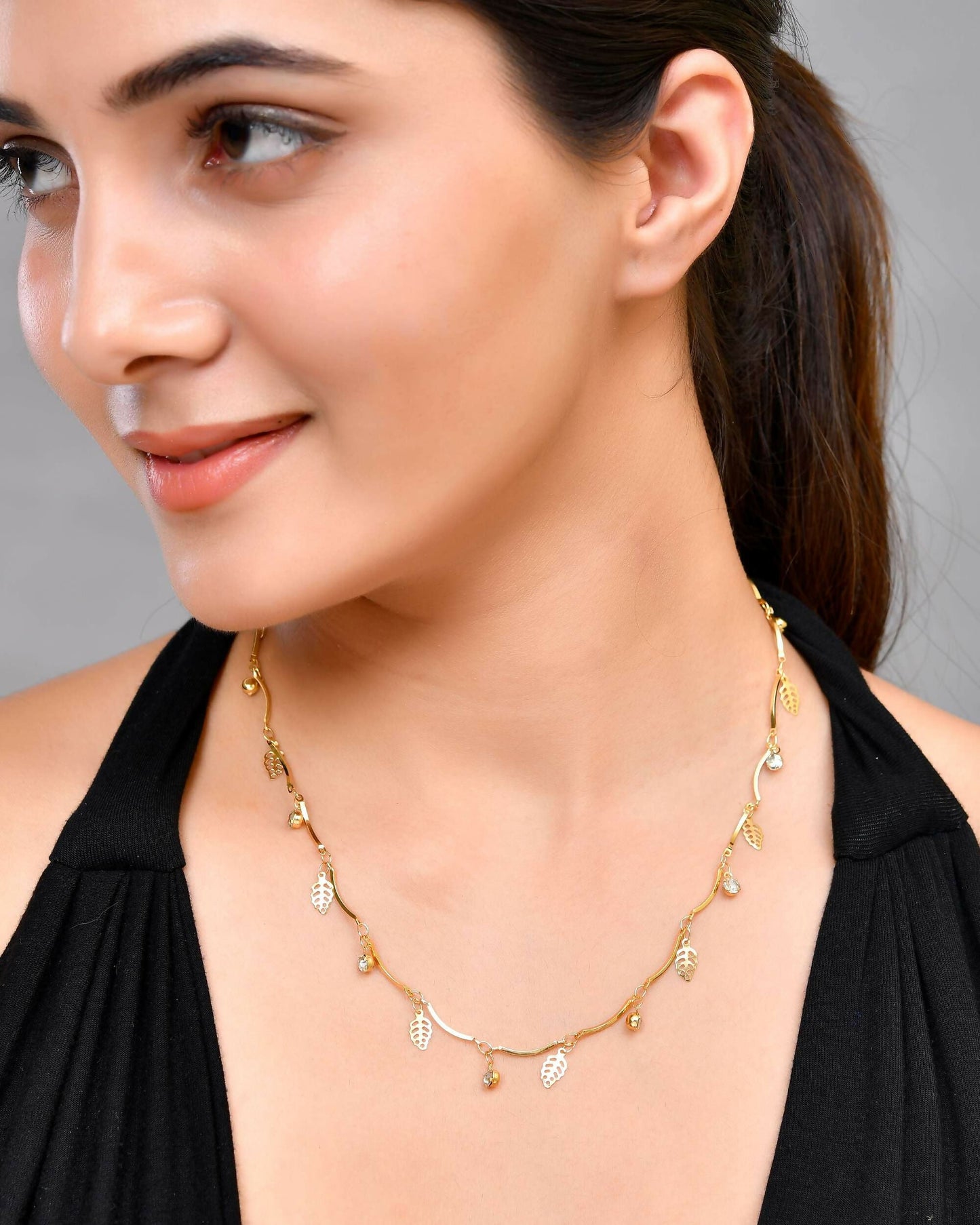 VOJ Gold-Polished Designer Chain For Women With AD Stone And Leaf | Swadesiicart
