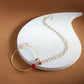 Gold-Polished White Red Kundan-Studded Pearl Beaded Nosepin - Ruby Raang | Swadesiicart