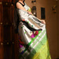 Very Much Indian Premium Handloom Pure Silk Muniya Borde-Parrot Green,Silver Zari And Intricate Big Radha Krishna Pallu | Swadesiicart