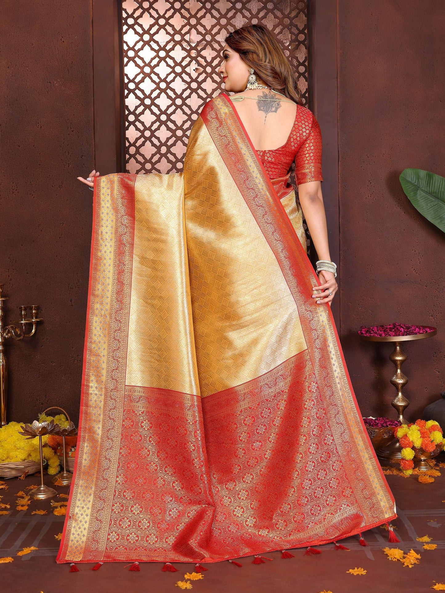 Aastha Fashion Cream Tissue Silk Woven Saree