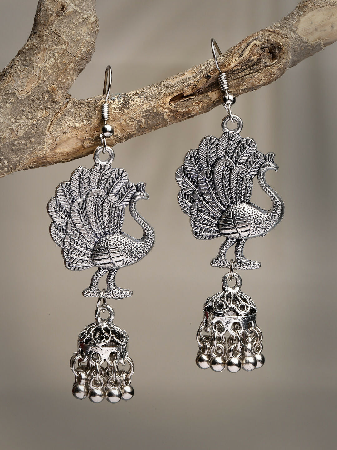 NVR Women's Silver-Toned Peacock Desing German Silver Oxidised Dome Shaped Jhumka Earrings | Swadesiicart