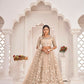 Aastha Fashion Dusty Chiku Butterfly Net White Cotton Thread Work, Zari Work And Sandwich Sequence Work Embroidery Wedding Wear Lehenga Choli
