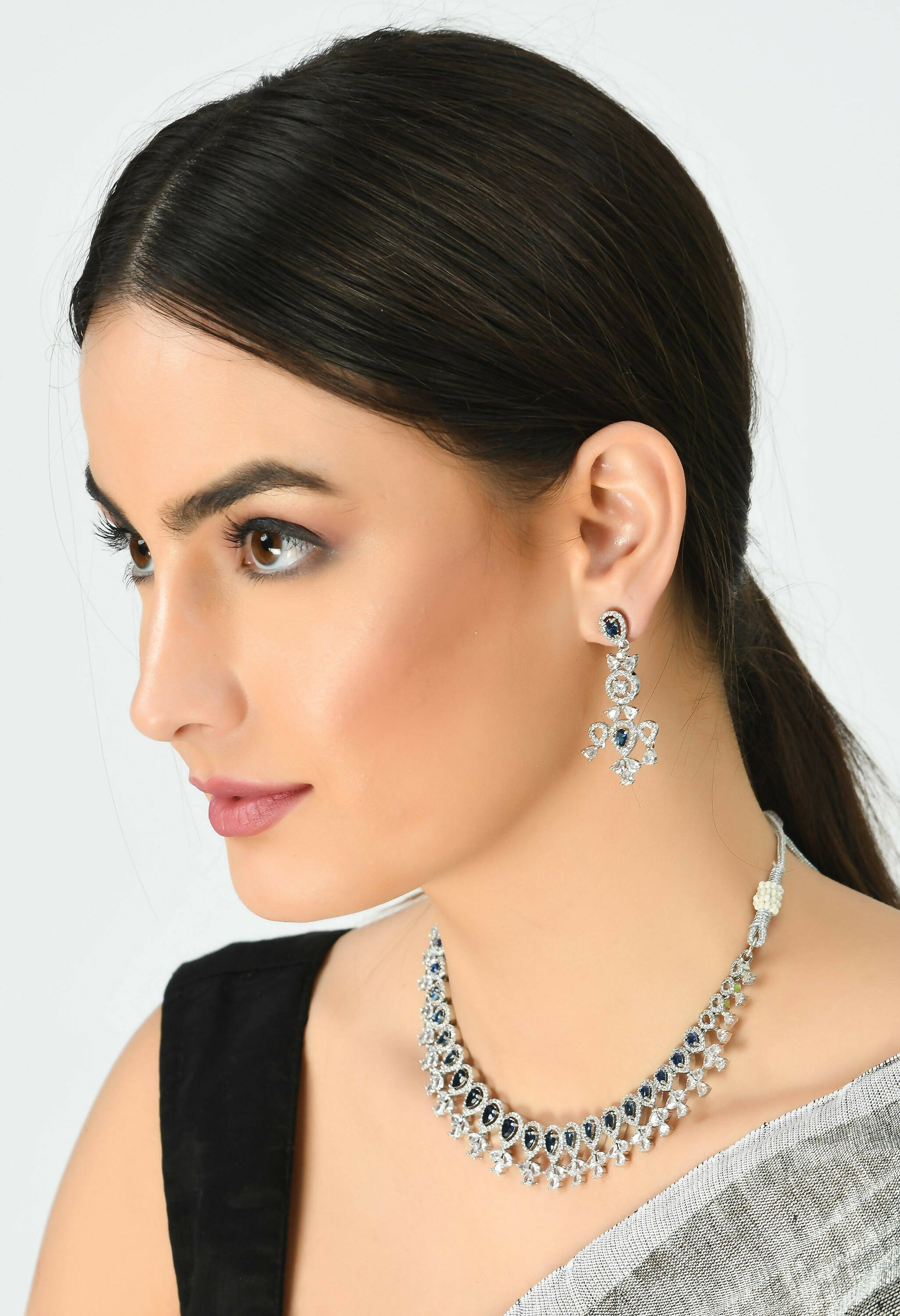 Mominos Fashion Johar Kamal Silver-Plated American Diamond Silver Blue Choker Set | Swadesiicart