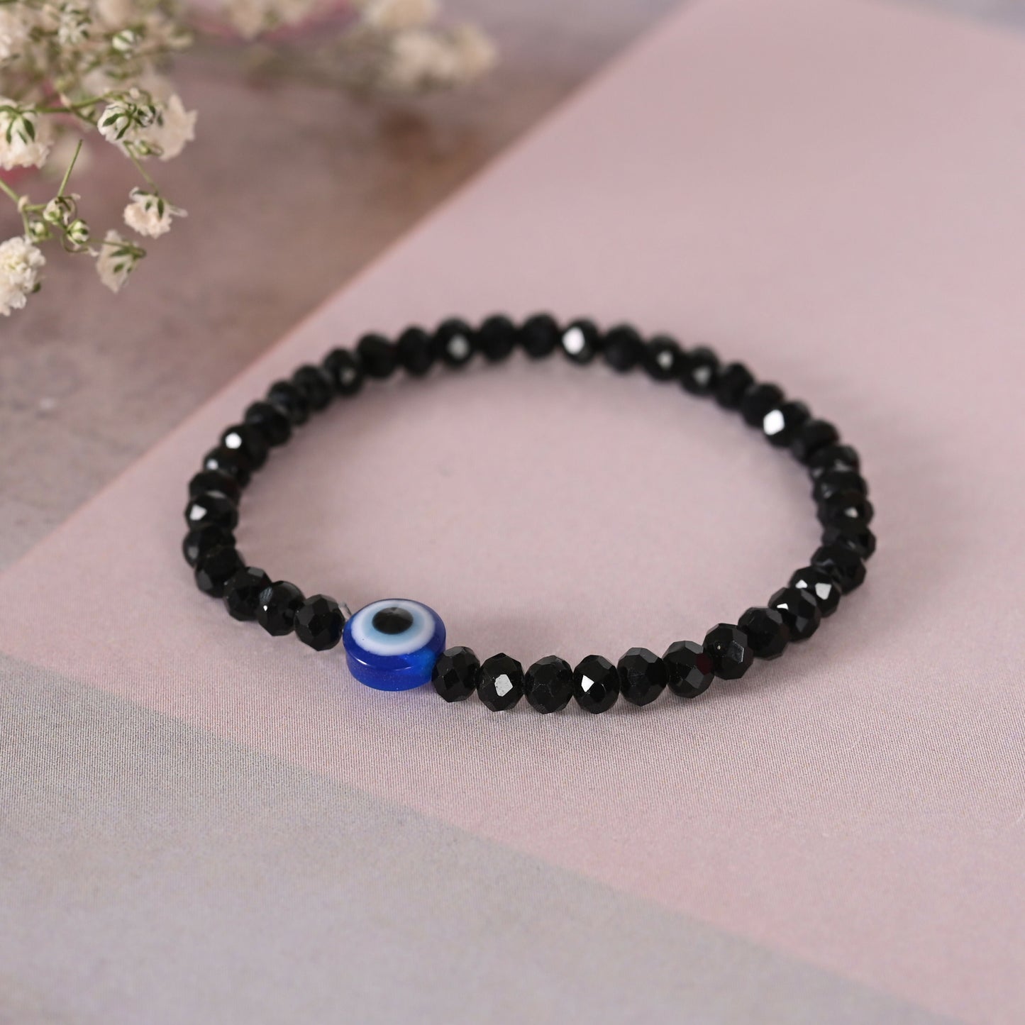 NVR Men & Women Black Evil Eye Crystal Elasticated Bracelet - Swadesiicart