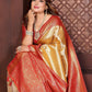 Aastha Fashion Cream Tissue Silk Woven Saree