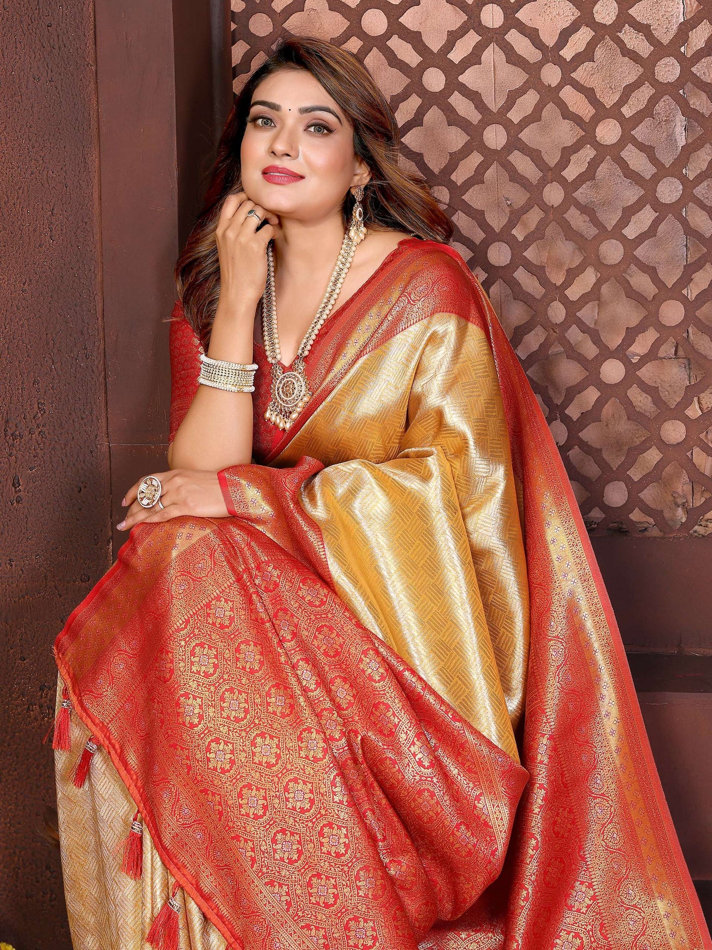 Aastha Fashion Cream Tissue Silk Woven Saree