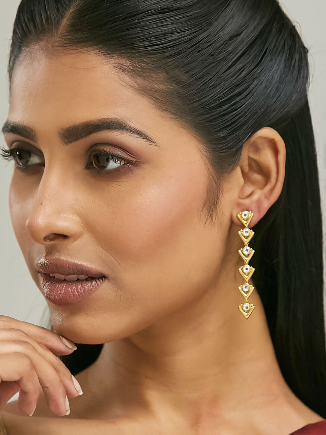 Nuyug 18K Gold-Plated Crystal Stone Studded Triangular Drop Sleek Earrings | Swadesiicart