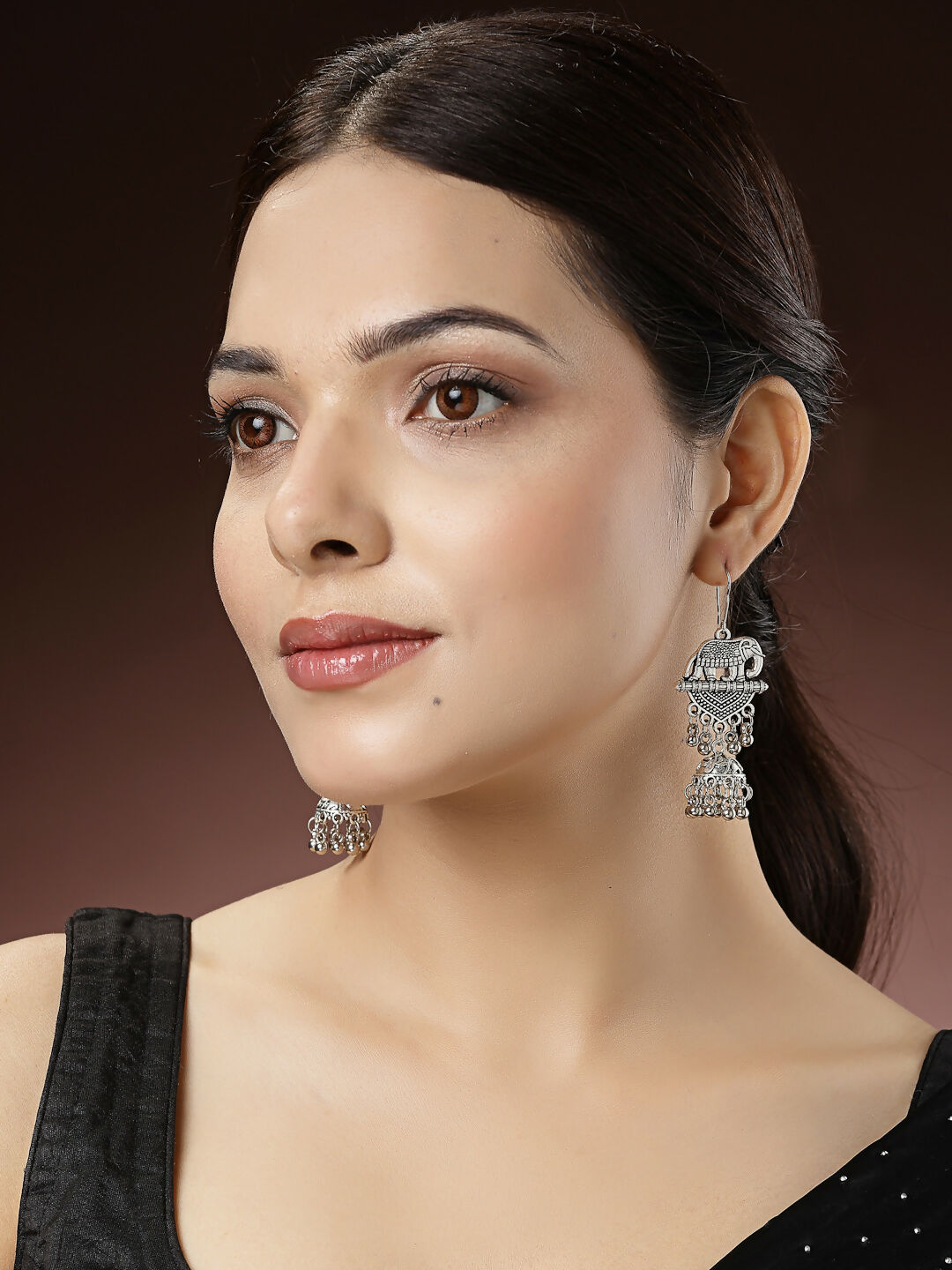NVR Women's Silver-Toned Elephant Design German Silver Oxidised Dome Shaped Jhumka Earrings | Swadesiicart