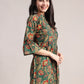 Aavyora Women's Ethnic Floral Printed Tunic - Green with Red & Gold Accents, Pin-Tucked Front, and Flared Hem