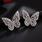 Yellow Chimes Silver-Toned & Pink Quirky Butterfly Studs Earrings