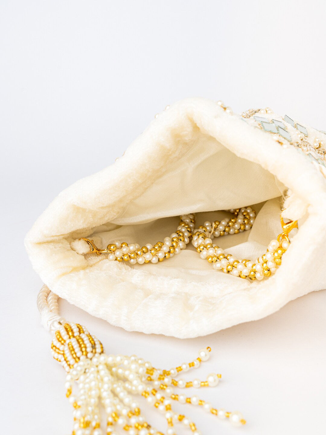 NR By Nidhi Rathi White Mirror Work Embroidered Potli Clutch - Swadesiicart