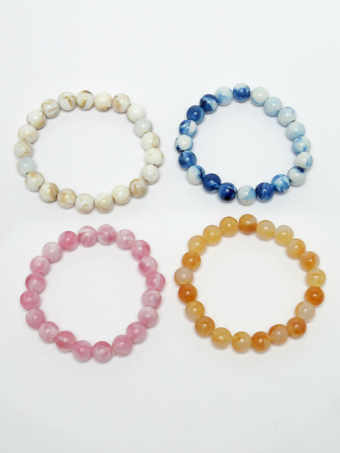 NVR Women & Men Set of 4 Multicolor Elasticated Rakhi With Roli Chawal | Swadesiicart