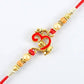Auspicious Om Pearl Rakhi & Kaju Roll Box